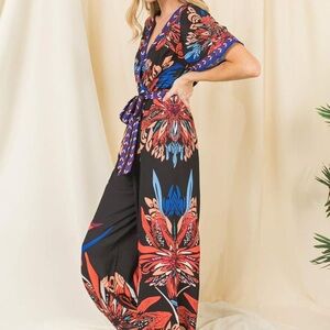 Flying Tomato Black Jumpsuit with Red and Blue Floral Pattern